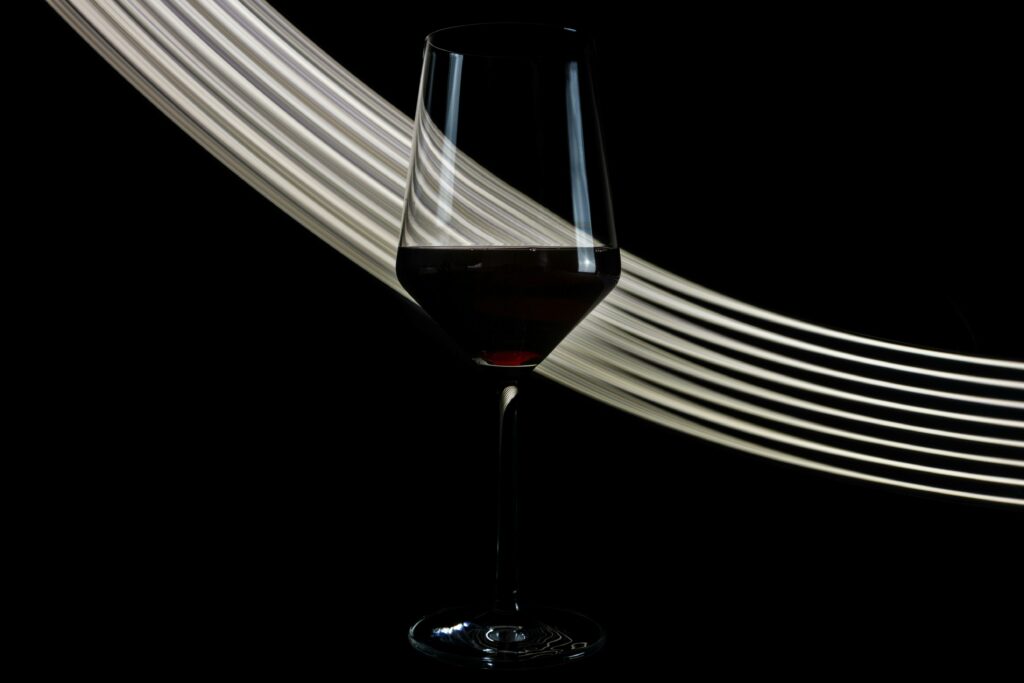 wine glass on black background, Malbec wines